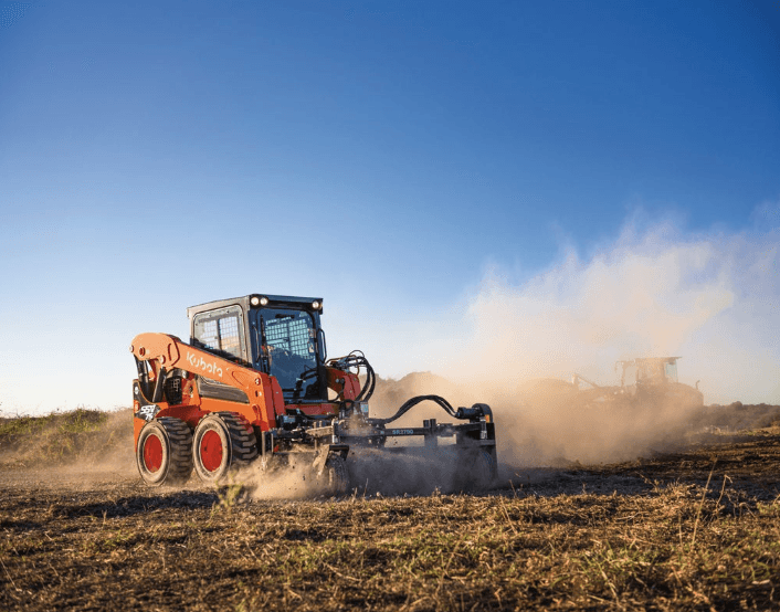 Skid Steer leveling the ground