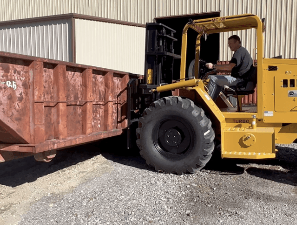 Master Craft forklift lifting a trailer