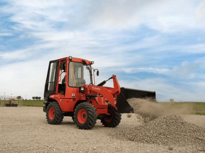 Wheel Loader dumping gravel onto a pile