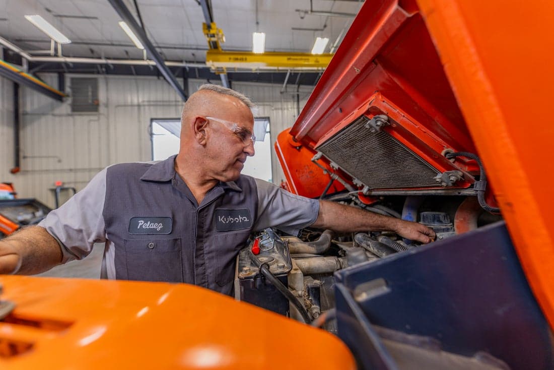 Service Technician working on equipment