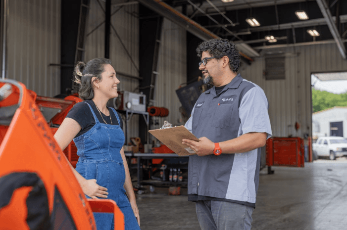 Service Technician consulting with customer